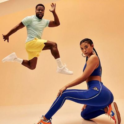 Eniko and Kevin on a photoshoot for her fitness brand Fabletics.